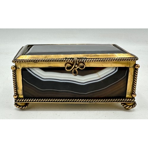 1334 - Two pieces of banded agate, one a paperweight 11.5 x 8cm and one rectangular box with gilt mounts 11... 