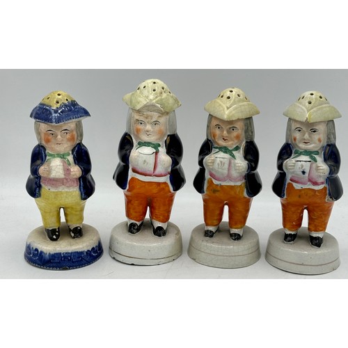 An assortment of 19thC Staffordshire cruet figures, the majority ...