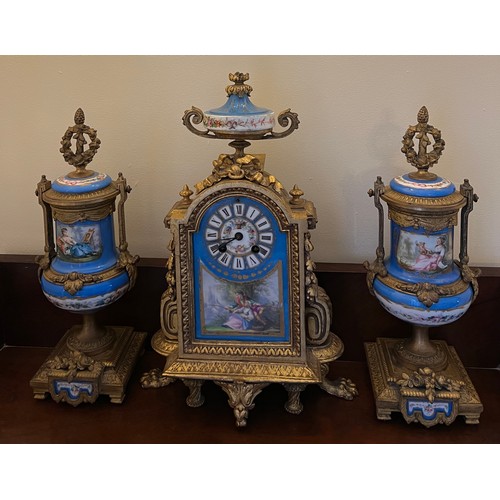 1265 - A French gilt metal mantle clock with a painted porcelain face, case back stamped  P.H. Mourey 74, h... 