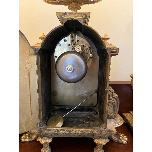 1265 - A French gilt metal mantle clock with a painted porcelain face, case back stamped  P.H. Mourey 74, h... 