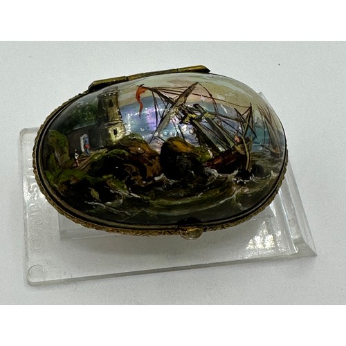 1400 - A fine quality mother of pearl miniature scent bottle holder with hand painted lid of ship in stormy... 