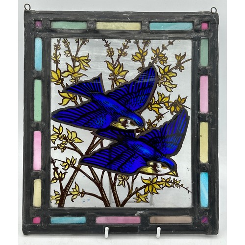 339 - Two vintage painted stained glass plaques depicting blue birds. Largest 22 x 21.5cm, smallest 12.5 x... 