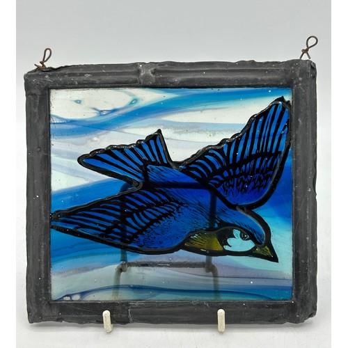 339 - Two vintage painted stained glass plaques depicting blue birds. Largest 22 x 21.5cm, smallest 12.5 x... 