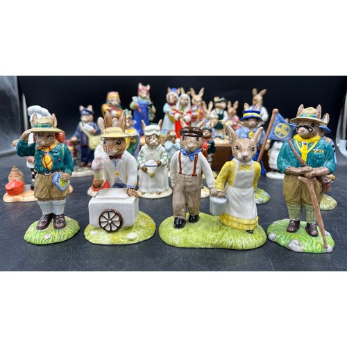 127 - A large collection of Royal Doulton Bunnykins to include Mystic Bunnykings, Scout Bunnykins DB 197 w... 