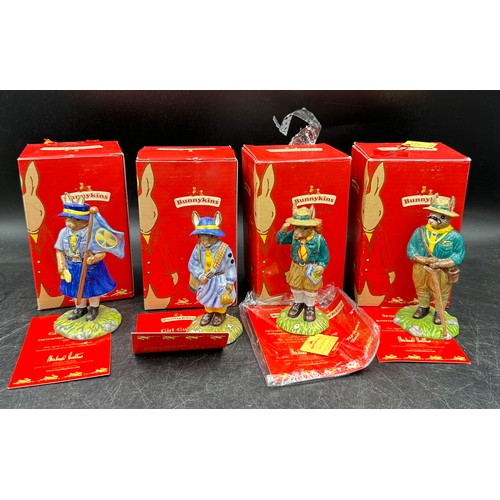 127 - A large collection of Royal Doulton Bunnykins to include Mystic Bunnykings, Scout Bunnykins DB 197 w... 