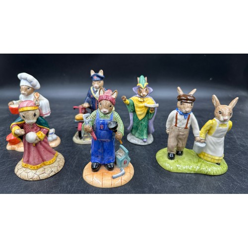 127 - A large collection of Royal Doulton Bunnykins to include Mystic Bunnykings, Scout Bunnykins DB 197 w... 