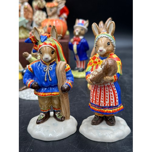 128 - A large collection of Royal Doulton Bunnykins to include Summer Lapland DB298, Winter Lapland, DB 29... 