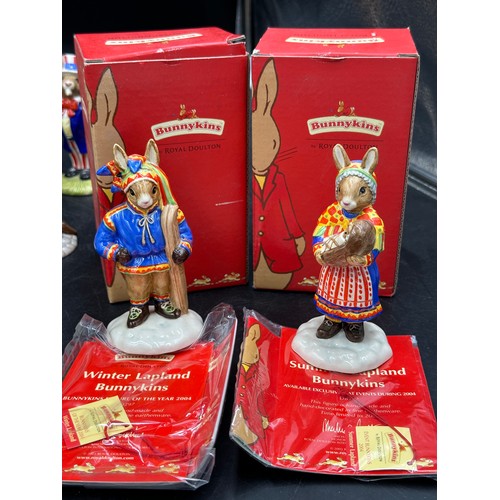 128 - A large collection of Royal Doulton Bunnykins to include Summer Lapland DB298, Winter Lapland, DB 29... 