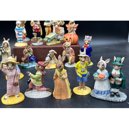 128 - A large collection of Royal Doulton Bunnykins to include Summer Lapland DB298, Winter Lapland, DB 29... 