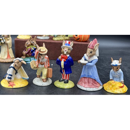 128 - A large collection of Royal Doulton Bunnykins to include Summer Lapland DB298, Winter Lapland, DB 29... 