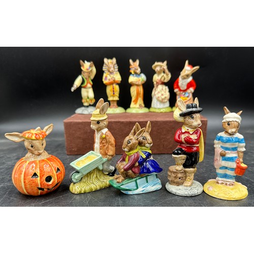 128 - A large collection of Royal Doulton Bunnykins to include Summer Lapland DB298, Winter Lapland, DB 29... 