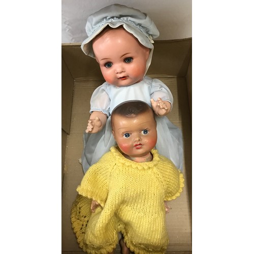 1068 - An Armand Marseille Doll, 39cm l, marked A.M. Germany 518/3/2K, with open mouth and eyes, dressed in... 