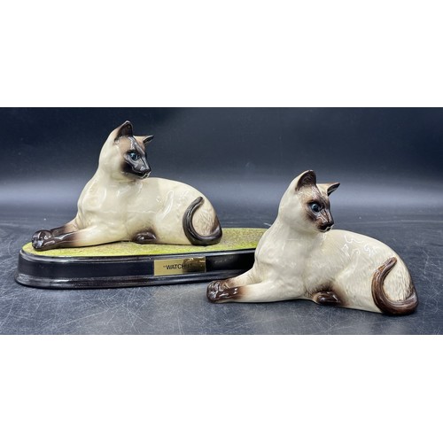 119 - A collection of ceramic cats to include two Beswick Siamese, 3 x Just Cats & Co etc. (7). Tallest bl... 