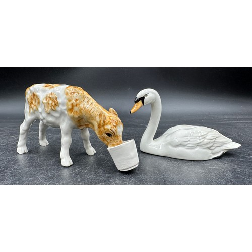 120 - Ceramic figurines to include: Beswick Hereford Bull and swan, 3 x Coopercraft Black Face sheep and a... 