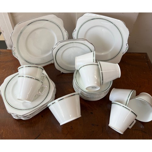 114 - An Art Deco Osborne bone china tea-service comprising 12 tea plates, 12 saucers, 2 bead and butter p... 