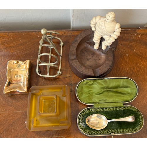 1321 - Miscellany to include an original Michelin man Bakelite ashtray, amber glass ashtray, Benson and Hed... 