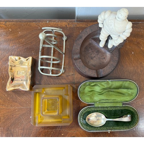 1321 - Miscellany to include an original Michelin man Bakelite ashtray, amber glass ashtray, Benson and Hed... 