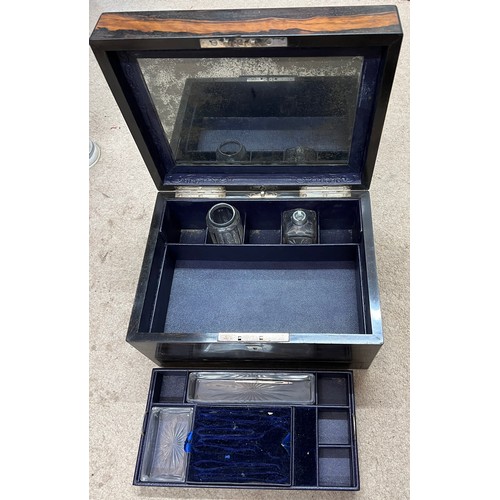 1169 - A 19thC coromandel dressing case with jewellery drawer and internal mirror. Marked to drawer Parkins... 