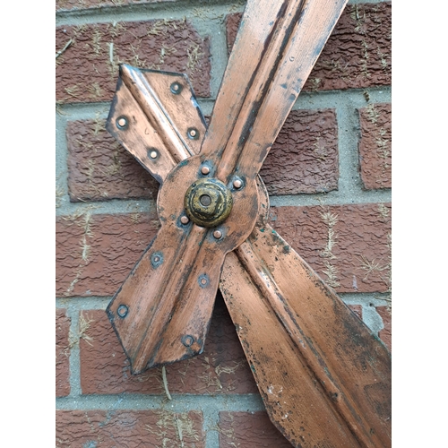 1262 - A very large wall mounted turret garden clock. 92cm d. Gillett & Co mechanism.