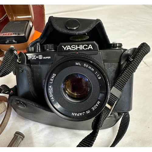 1317 - A miscellany to include 2 vintage cased Agfa Silette cameras, a Yashica FX-3 Super camera, a boxed A... 