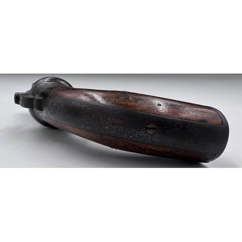 1209 - A pepper pot percussion cap six-shot pistol with walnut stock and engraved decoration.