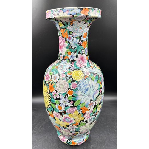 1159 - A 19thC Chinese Mille Fleur vase with six character Jiaqing mark, probably not period. 56cm h, neck ... 