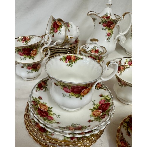 117 - Royal Albert Country Roses. Various items to include: coffee pot 20cm h, teapot 17cm h, 2 x jugs, 2 ... 