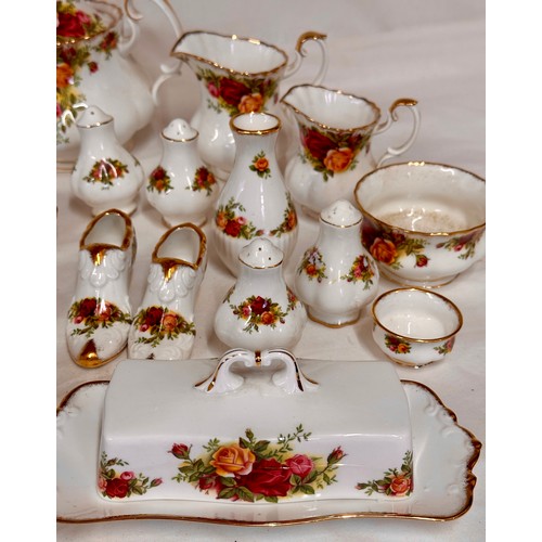 117 - Royal Albert Country Roses. Various items to include: coffee pot 20cm h, teapot 17cm h, 2 x jugs, 2 ... 