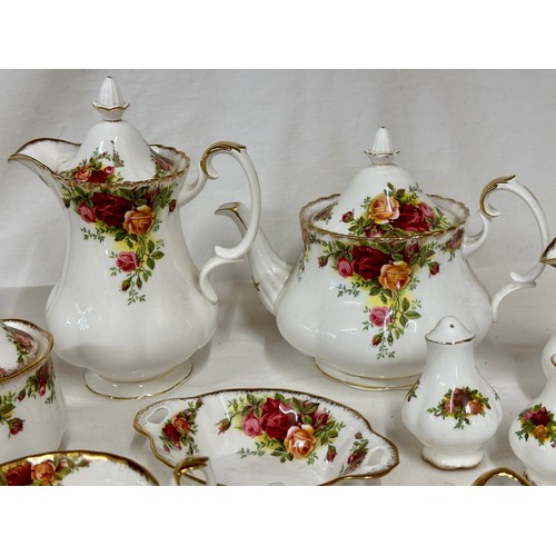 117 - Royal Albert Country Roses. Various items to include: coffee pot 20cm h, teapot 17cm h, 2 x jugs, 2 ... 