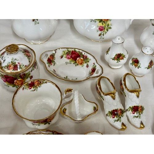 117 - Royal Albert Country Roses. Various items to include: coffee pot 20cm h, teapot 17cm h, 2 x jugs, 2 ... 