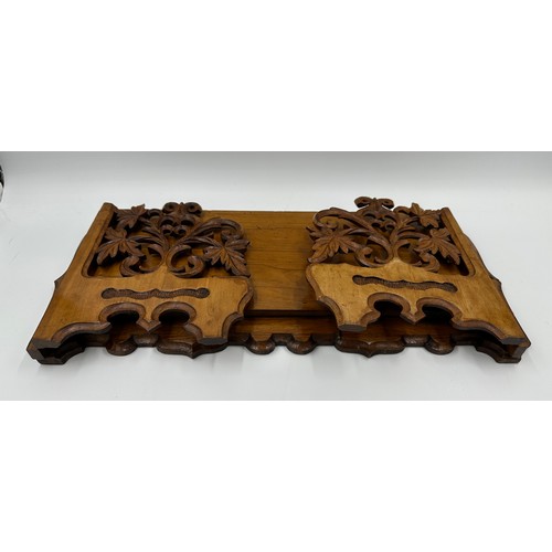 1154 - A Chinese carved wooden Dragon lamp and shade with a carved wooden folding bookstand.