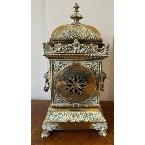 1268 - An ornate brass mantle clock with white enamel face. Presented to Lieut. D Blair by the NCO’s and me... 