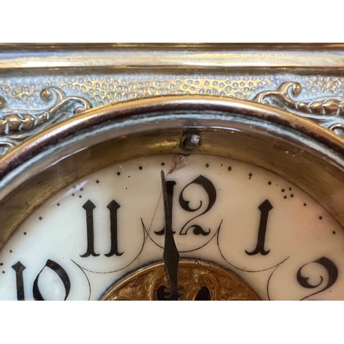 1268 - An ornate brass mantle clock with white enamel face. Presented to Lieut. D Blair by the NCO’s and me... 