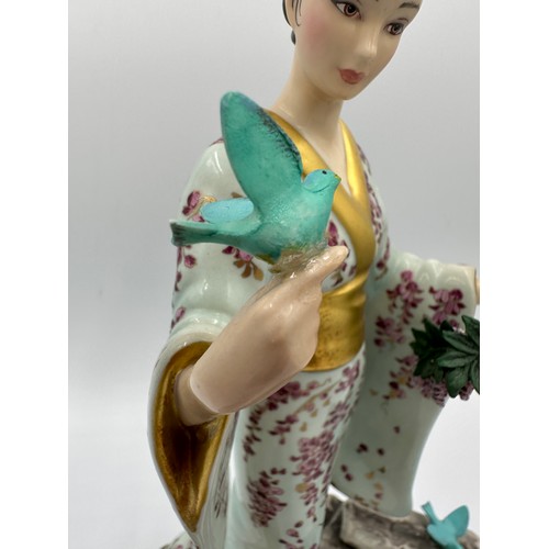 206 - A Franklin Mint porcelain figure modelled as Mariko, Princess of The Wisteria Blooms, designed by Ma... 