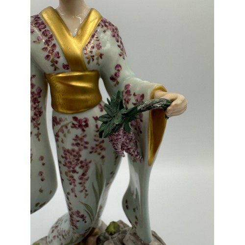 206 - A Franklin Mint porcelain figure modelled as Mariko, Princess of The Wisteria Blooms, designed by Ma... 