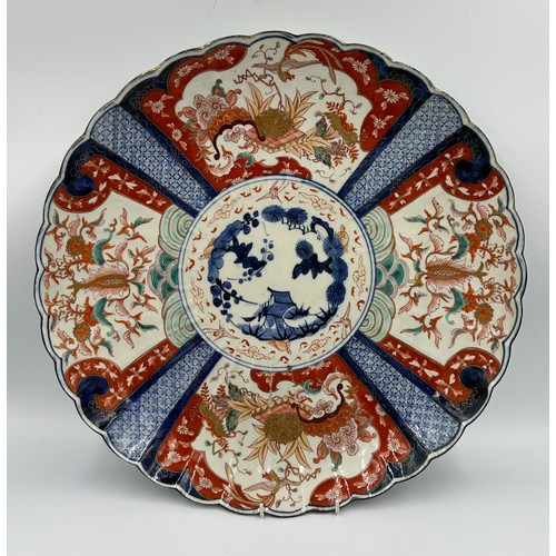 207 - Two large oriental Imari chargers, 56 and 45.5cm d.