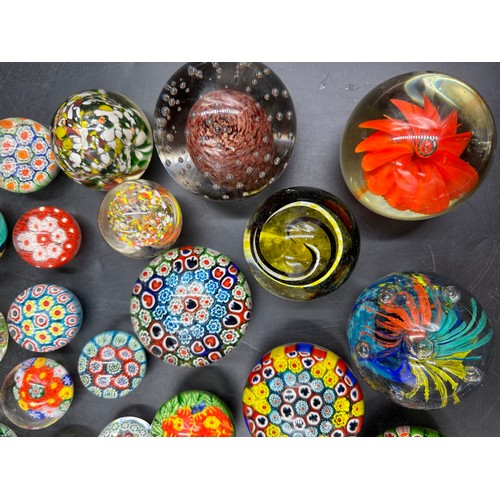 303 - An assortment of paper weights to include millefiori, vintage etc, all unmarked. Various sizes, see ... 