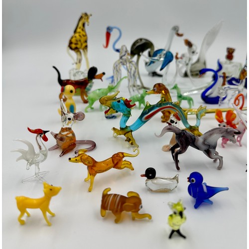 310 - Collection of approx 42 miniature glass animals, varying sizes, majority Murano, to include giraffe,... 