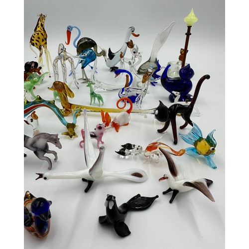 310 - Collection of approx 42 miniature glass animals, varying sizes, majority Murano, to include giraffe,... 