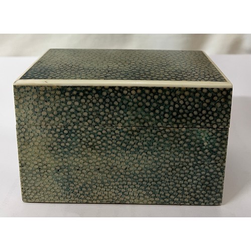 1168 - An Art Deco shagreen and ivory box. Red leather base marked ‘London made’. 11.5 x 6.5 x 7.5cm h. Ivo... 