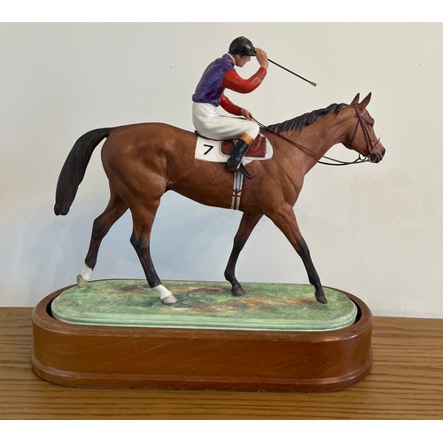 202 - Royal Worcester porcelain figure, modelled by Doris Lindner 'The Winner', 1959, on original wooden s... 