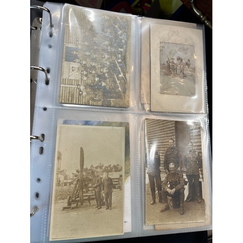 1215 - An album containing multiple postcards including WW1 and  WW1 silk postcards, funeral notices etc.