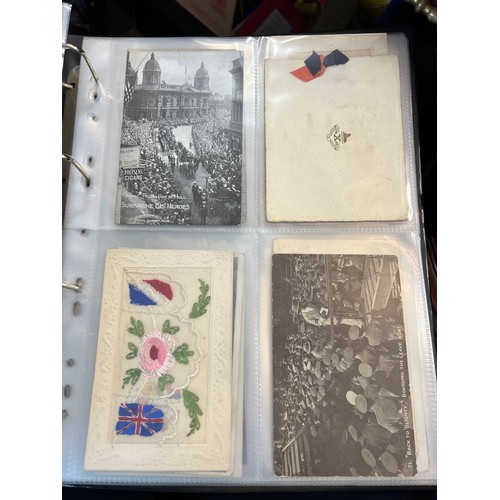 1215 - An album containing multiple postcards including WW1 and  WW1 silk postcards, funeral notices etc.