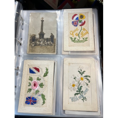 1215 - An album containing multiple postcards including WW1 and  WW1 silk postcards, funeral notices etc.