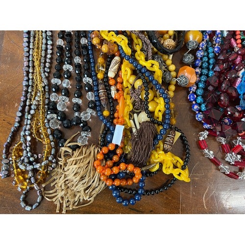 348 - A large quantity of good quality vintage bead necklaces to include glass, jet, resin etc.