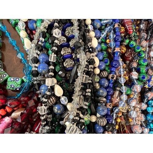 348 - A large quantity of good quality vintage bead necklaces to include glass, jet, resin etc.