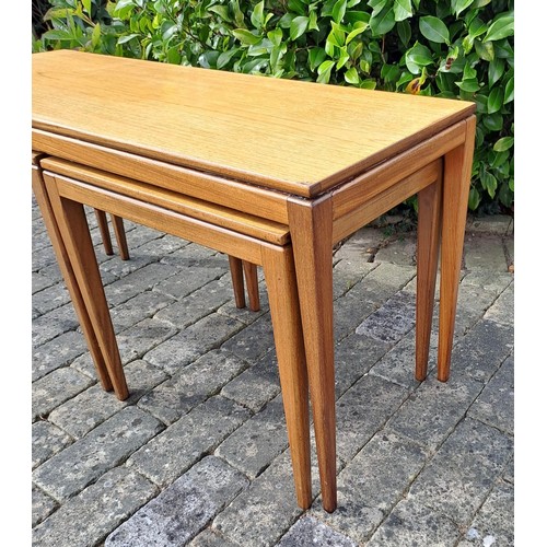 68 - A nest of three tables, largest 50cm h x 99cm w x 38cm d