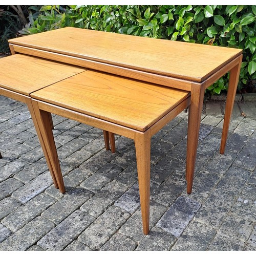 68 - A nest of three tables, largest 50cm h x 99cm w x 38cm d