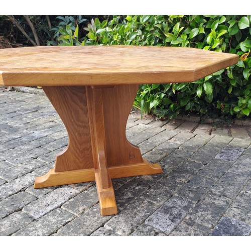 101 - An oak octagonal occasional table by Knightman with adzed top and Knightman mark. 49cm h x 92cm d