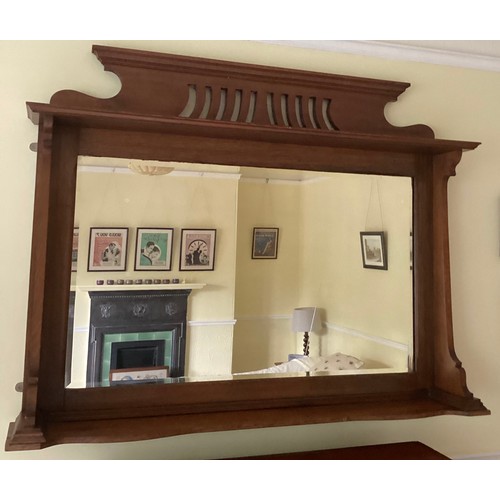 1223 - A 19thC bevelled over-mantle mirror. Approximate measurements 109cm h x 137cm w x 24cm d.